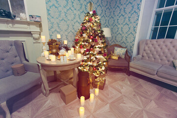 Luxury interior of living room with decorated Christmas tree and gifts on the wooden floor