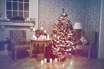 Luxury interior of living room with decorated Christmas tree and gifts on the wooden floor