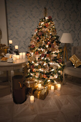 Luxury interior of living room with decorated Christmas tree and gifts on the wooden floor