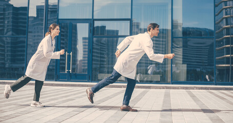 young doctors rush to an emergency call.