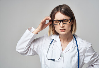woman doctor with stethoscope gesturing with hands emotions glasses model