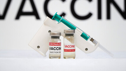 coronavirus vaccine, syringe, injection gun, White background
