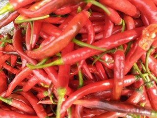 curly red chilies sold in traditional markets