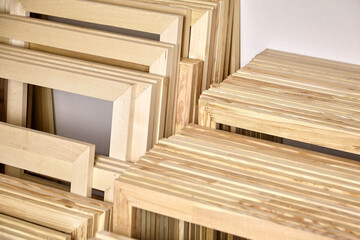 Stretcher bars, stack of wooden frames