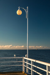 Pier in Jurata during sunny day. Poland, Pomorskie .