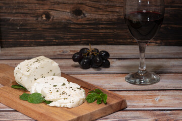 Traditional cyprus halloumi cheese and red wine on a table