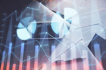 Multi exposure of forex graph hologram over desktop with phone. Top view. Mobile trade platform concept.