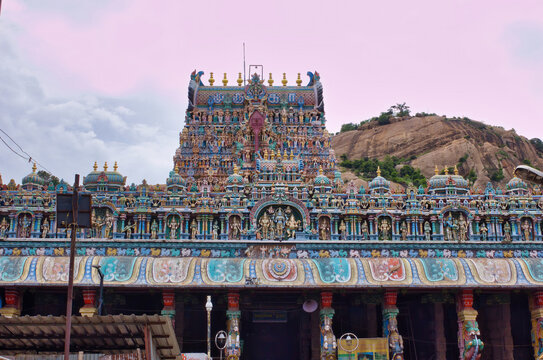 Madurai, India - November 02, 2018: Thiruparankundram Murugan Temple or Subramanya Swamy Temple is a Hindu temple and one of the Six Abodes of Murugan against rocky mountain