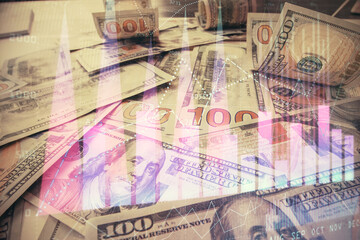 Multi exposure of forex chart drawing over us dollars bill background. Concept of financial success markets.