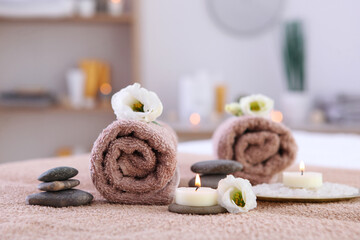 Obraz na płótnie Canvas Beautiful spa composition of towels and spa accessories