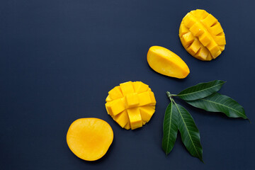 Tropical fruit, Mango  on dark background.