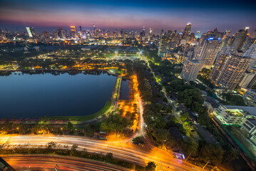 Panoramic View of Bangkok, Thailand. Cityscape with Public Park and Skyscrapers at Night