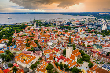 Amazing aerial drone shot of old town of Tallinn, Estonia at sunset