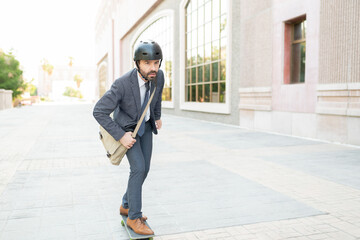 Professional man with a safety helmet riding a skateboard © AntonioDiaz