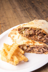 Traditional mexican gourmet food. Mexican food on table. Mexican burrito concept.