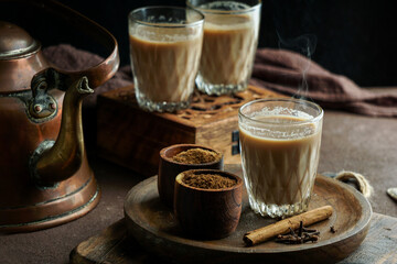 indian spicy tea masala, hot and delicious traditional drink of tea, milk and spices