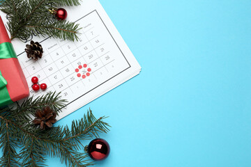 Flat lay composition with calendar on light blue background, space for text. Boxing day concept