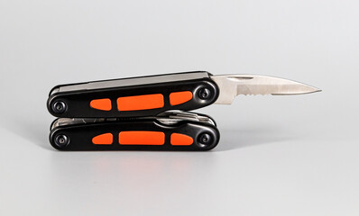 Multipurpose Tool - Multipurpose pliers, knife, screwdriver, hook, saw.