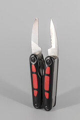 Multipurpose Tool - Multipurpose pliers, knife, screwdriver, hook, saw.