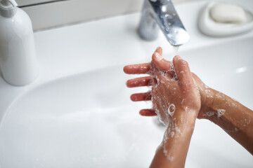 Washing hands with soap between fingers. Prevention of viral and bacterial infections. Fighting the coronavirus epidemic.