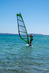 Summer vacation in France on Mediterranean sea, watersport activities in sunny day
