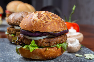 Healthy vegan or vegetarian fast food, fresh made plant based burgers with vegetables