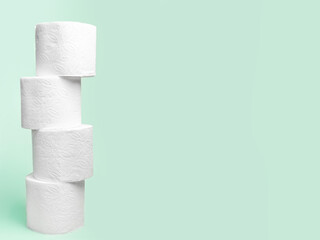 Toilet paper on a green background.