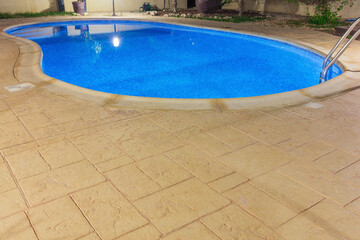 Blue water swimming pool close up view