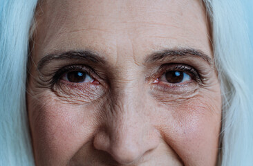 Beautiful senior woman posing on a photoshooting