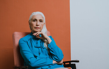 Beautiful senior woman posing on a photoshooting