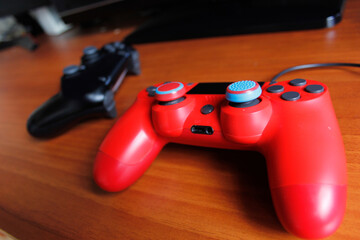 video game controller on brown background