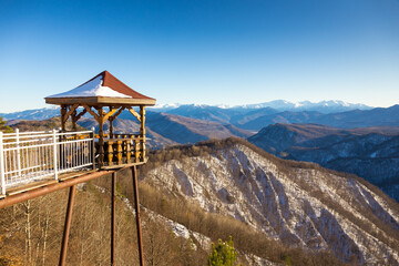 Wooden pavilion with scenery mountains view, Caucasus.