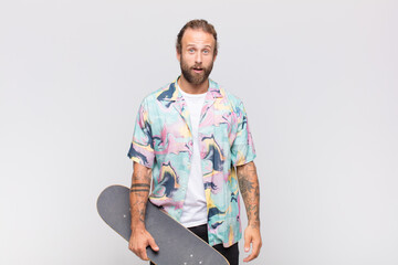 blonde man looking very shocked or surprised, staring with open mouth saying wow