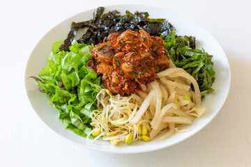 Korean food, Kkomag Bibimbab which is mixed with rice, vegetables and blood cockle