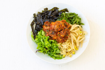 Korean food, Kkomag Bibimbab which is mixed with rice, vegetables and blood cockle