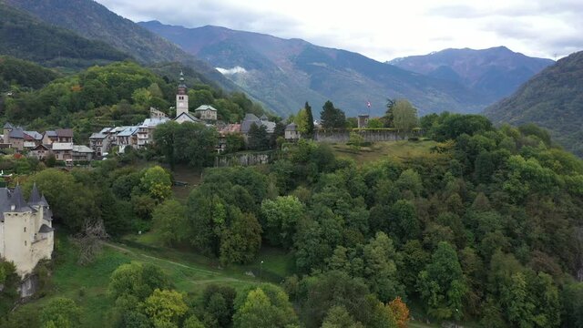 Aerial shot of the pretty old town (Conflans) overlooking Albertville, beautiful view of an old city surrounded by mountains,  View of the Conflans, the medieval city located in upper savoy, France