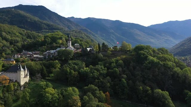 Aerial shot of the pretty old town (Conflans) overlooking Albertville, beautiful view of an old city surrounded by mountains,  View of the Conflans, the medieval city located in upper savoy, France