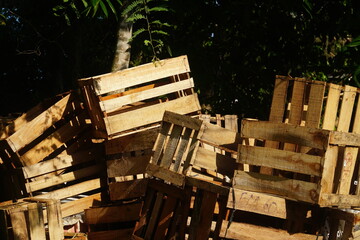 Empty wooden fruit box. Stacked irregularly