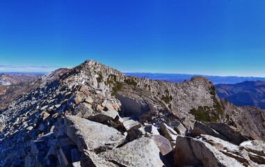 White Baldy peak views in Lone Peak Wilderness mountain landscape from Pfeifferhorn hiking trail, Wasatch Rocky mountain range, Utah, United States.