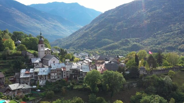 Aerial shot of the pretty old town (Conflans) overlooking Albertville, beautiful view of an old city surrounded by mountains,  View of the Conflans, the medieval city located in upper savoy, France