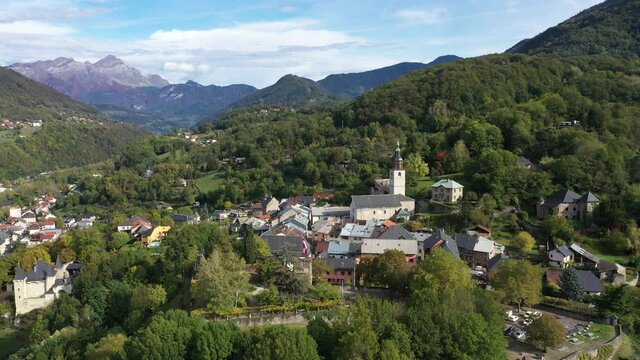 Aerial shot of the pretty old town (Conflans) overlooking Albertville, beautiful view of an old city surrounded by mountains,  View of the Conflans, the medieval city located in upper savoy, France