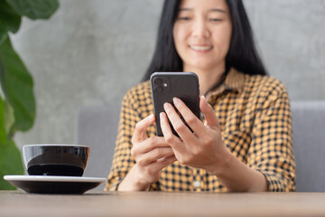 contact us.using cell phone.woman hand holding texting message mobile chatting,search internet...