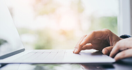 contact us.using computer.woman hand typing keyboard laptop work online chatting search form...