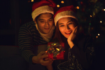 couple have ramantic moment together at christmas and new year celebration