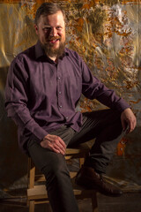 Obraz premium Mature bearded man dressed in shirt studio portrait