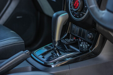 automatic transmission shift selector in the car interior. Closeup a manual shift of modern car...