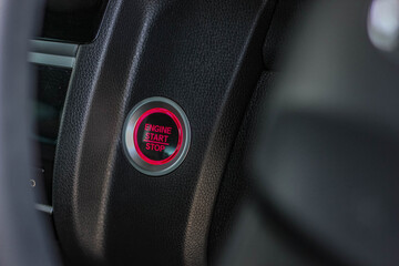 Close up engine car start button. Start stop engine modern new car button,Makes it easy to turn...