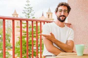 young bearded man having a coffee