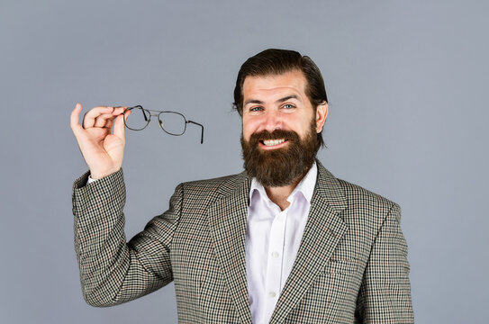 confidence and charisma. handsome man wear office suit. male beauty and fashion. brutal businessman with perfect beard and moustache. real boss in jacket. mature man wear glasses. Sexy and smart