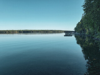 Calm lake at sunrise, Child's Lake, Duck Mountain Provincial Park, Manitoba, Canada